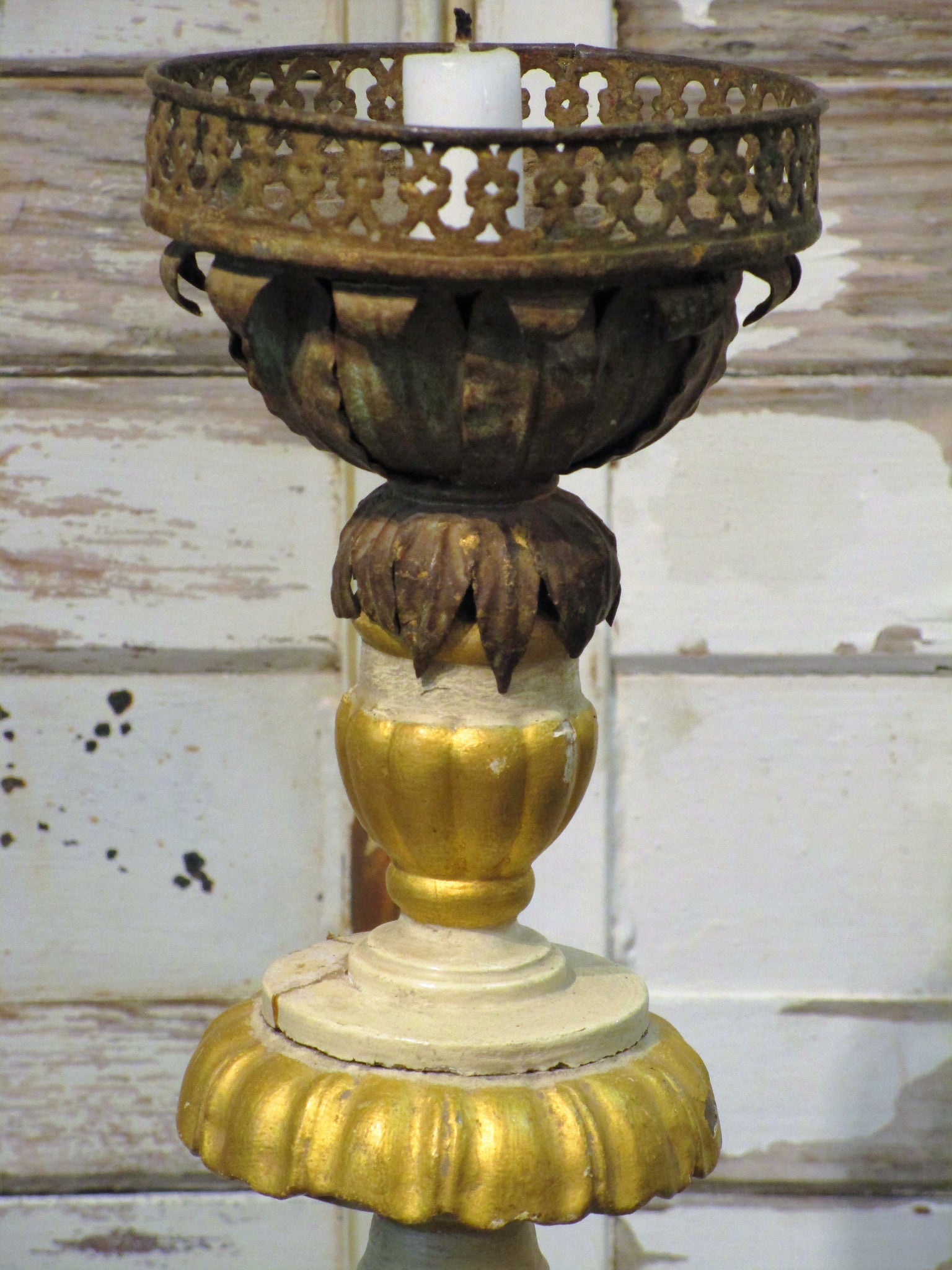 Antique carved candlestick with pineapple top