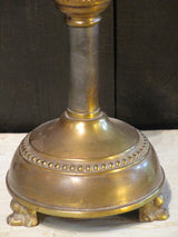 Antique French candlestick with bronze feet