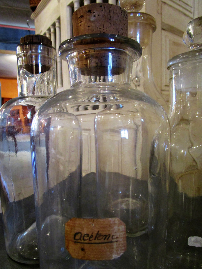 Set of four French glass apothecary jars
