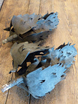 Rare pair of 18th century flame sculptures in iron
