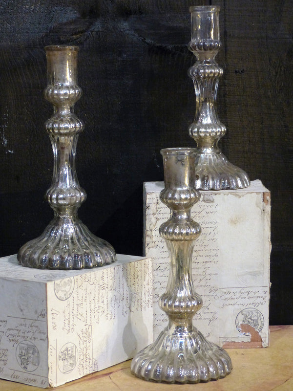 Three 19th century French candlesticks from a church in "œl'argent de pauvre"?