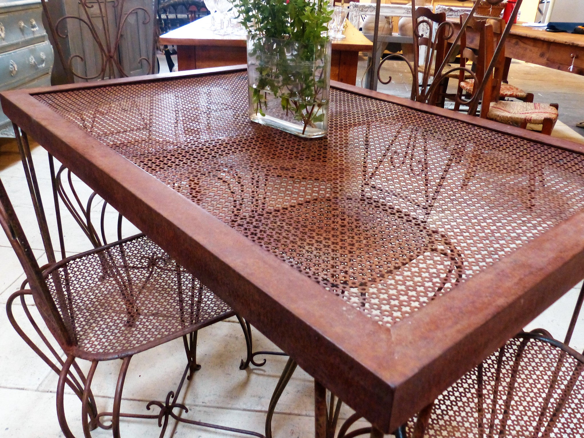 French garden setting four chairs