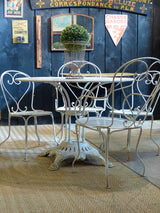 Round French garden table with 4 chairs – 1920’s