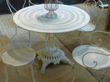 Round French garden table with 4 chairs – 1920’s