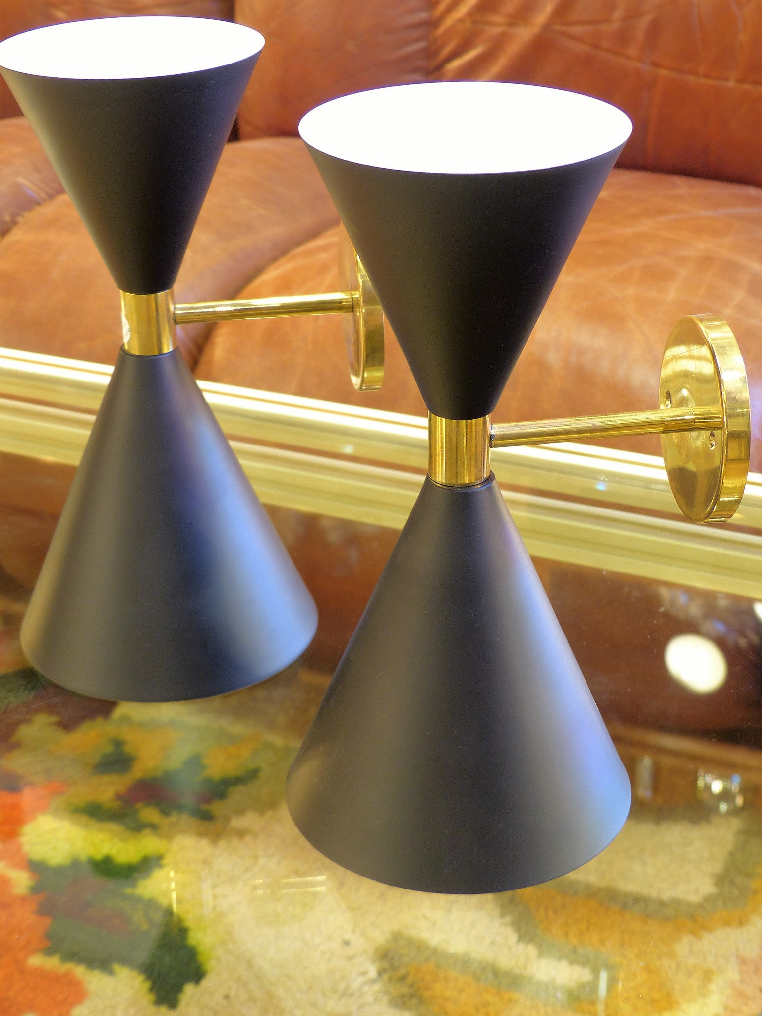 Pair of large black ‘Stilnovo’ wall sconces 