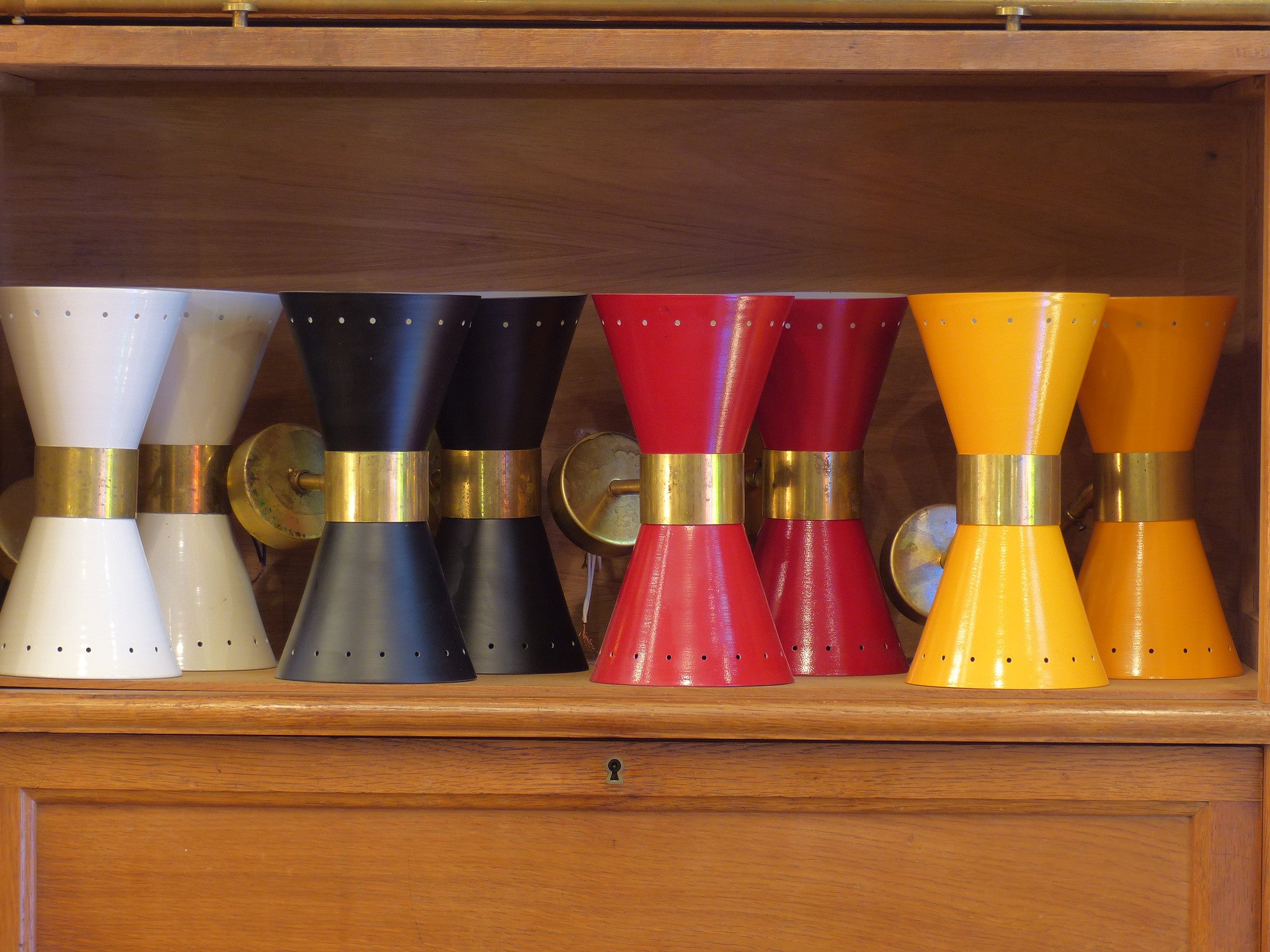 Pairs of ‘Stilnovo’ adjustable wall sconces