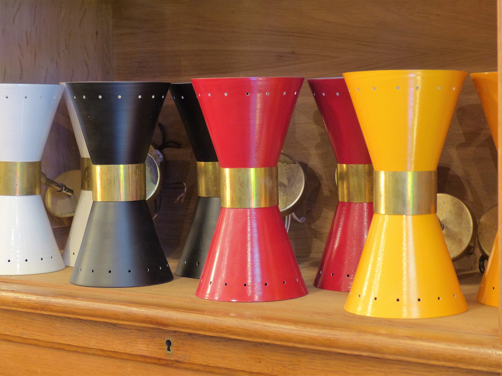 Pairs of ‘Stilnovo’ adjustable wall sconces