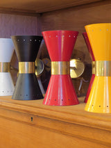 Pairs of "Stilnovo' adjustable wall sconces in various colours