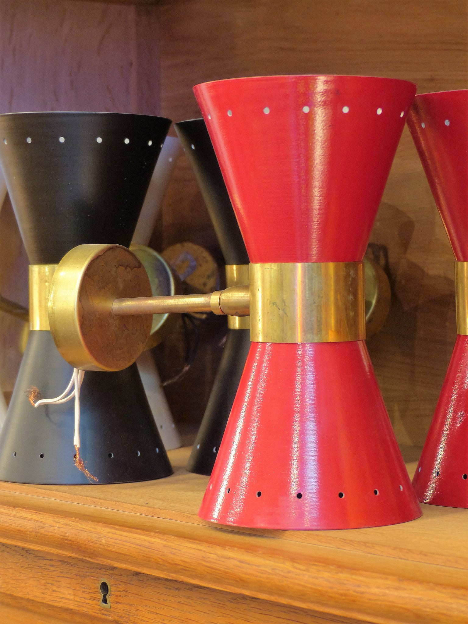 Pairs of ‘Stilnovo’ adjustable wall sconces