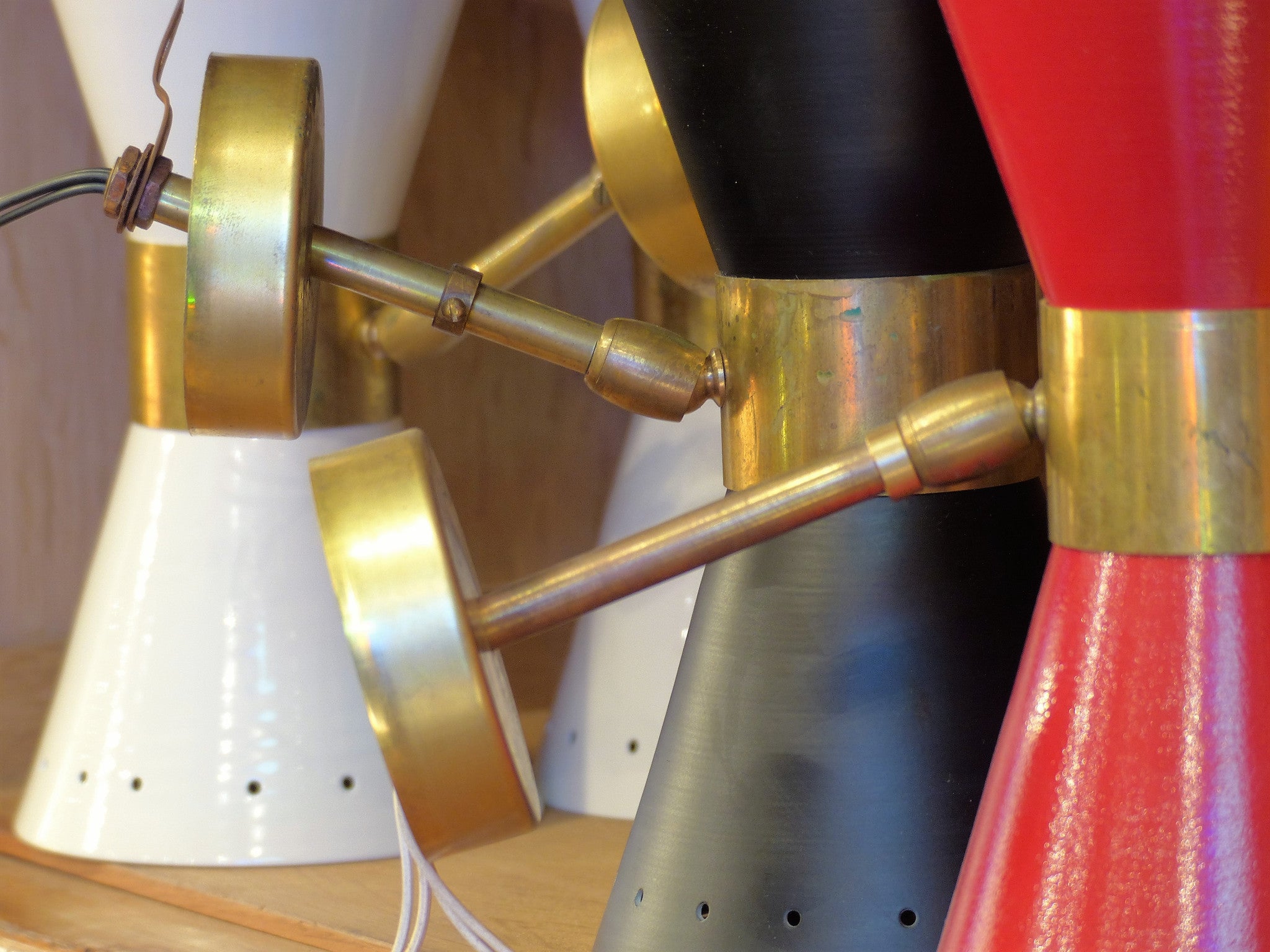 Pairs of ‘Stilnovo’ adjustable wall sconces