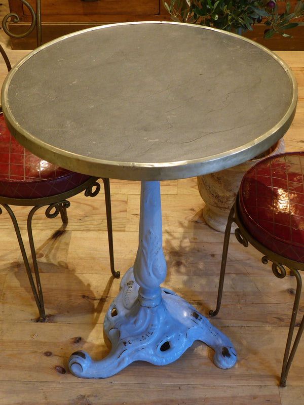 Bistro table, black marble top with blue stand
