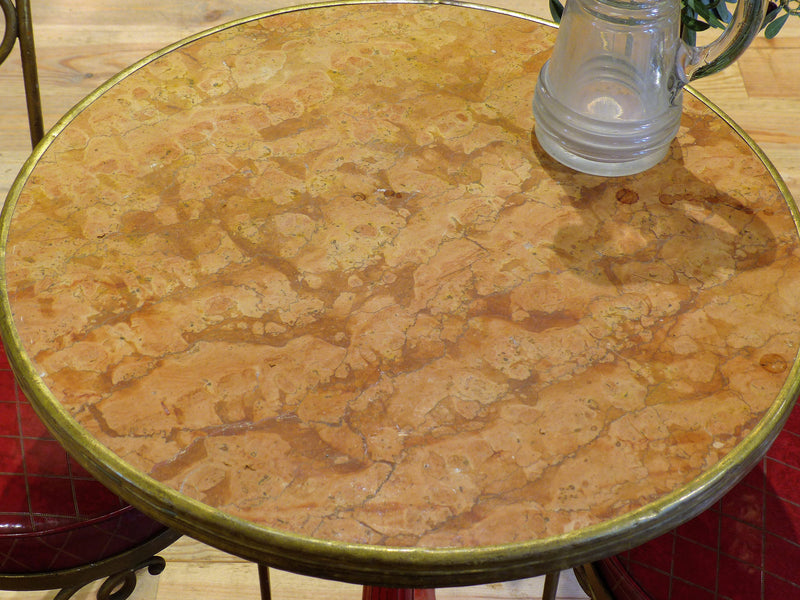 Round rose marble top bistro table with red stand