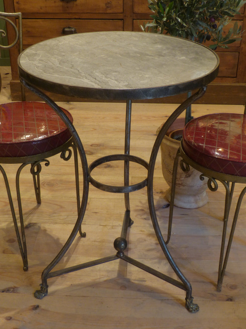 Round marble bistro table with cast iron legs