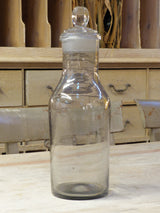Large grey apothecary bottle with lid