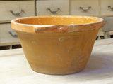 Rustic terracotta bowl with orange glaze