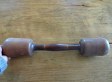 Three double headed pestles