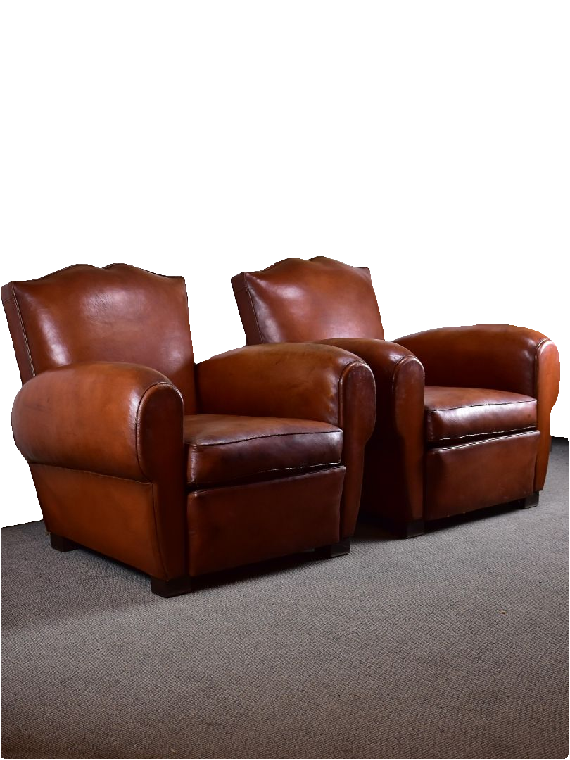 Pair of moustache back French leather club chairs