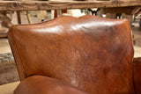 Pair of large vintage French club chairs with mustache back