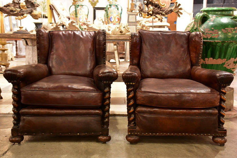 False pair of vintage French wingback club chairs
