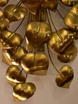 Sculptural vintage wall sconce with gold leaves