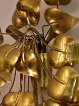 Sculptural vintage wall sconce with gold leaves